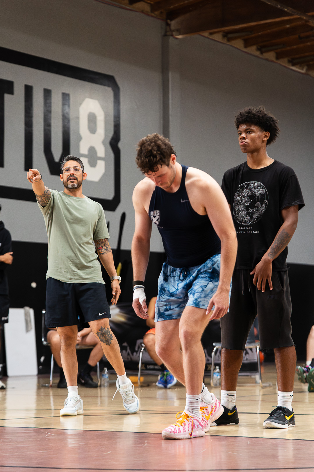Coach Josh coaching footwork with a group