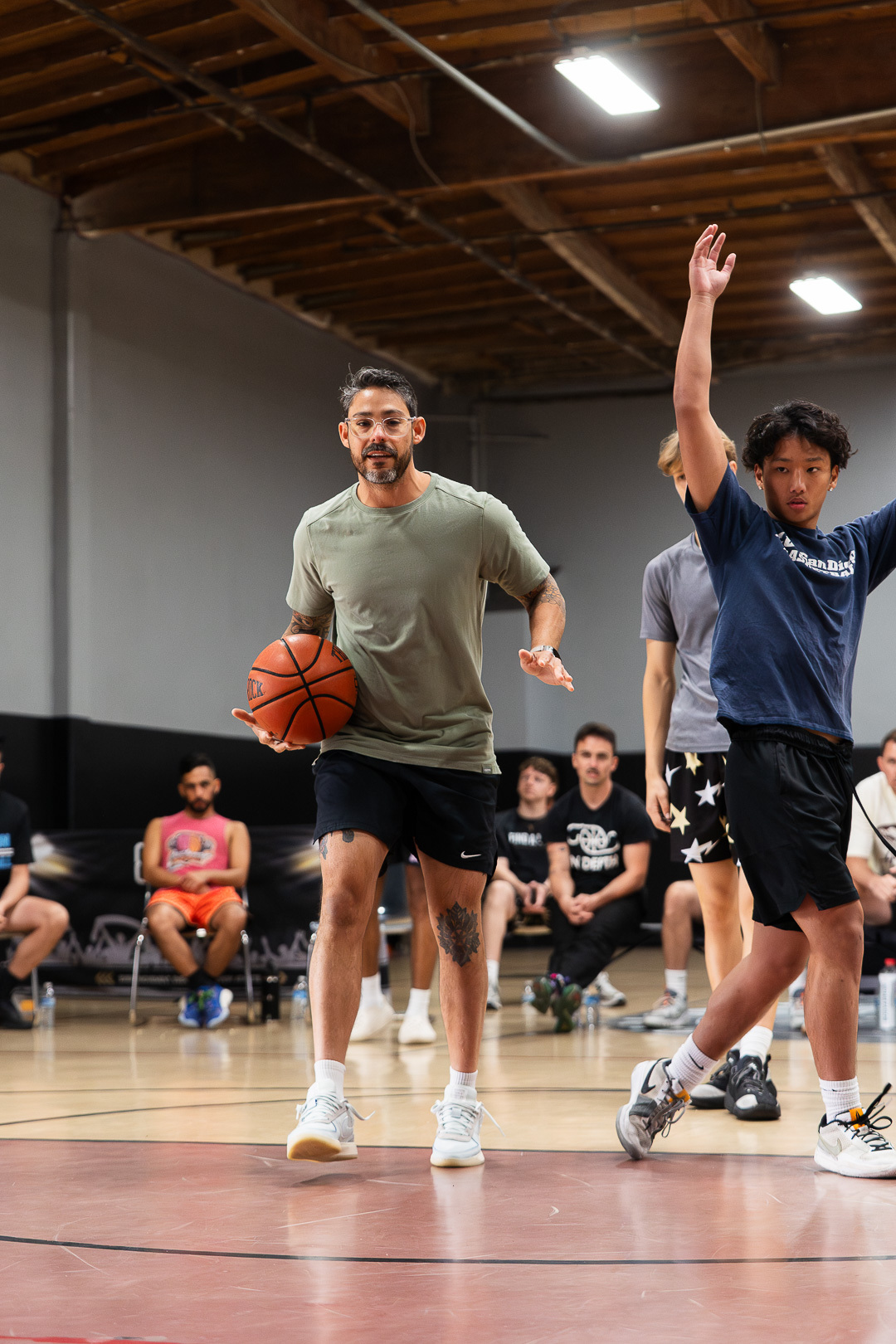Coach Joshua Mercado running a live ball-handling drill at Prime By Design