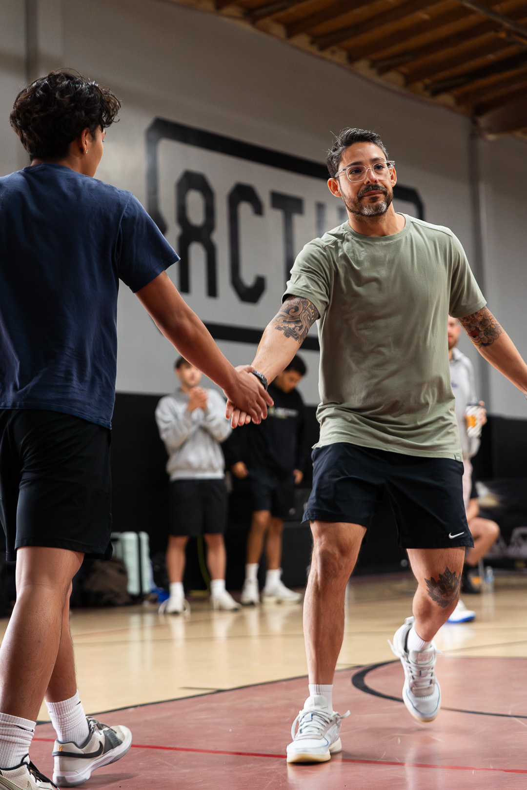 Coach Josh working one-on-one with an athlete
